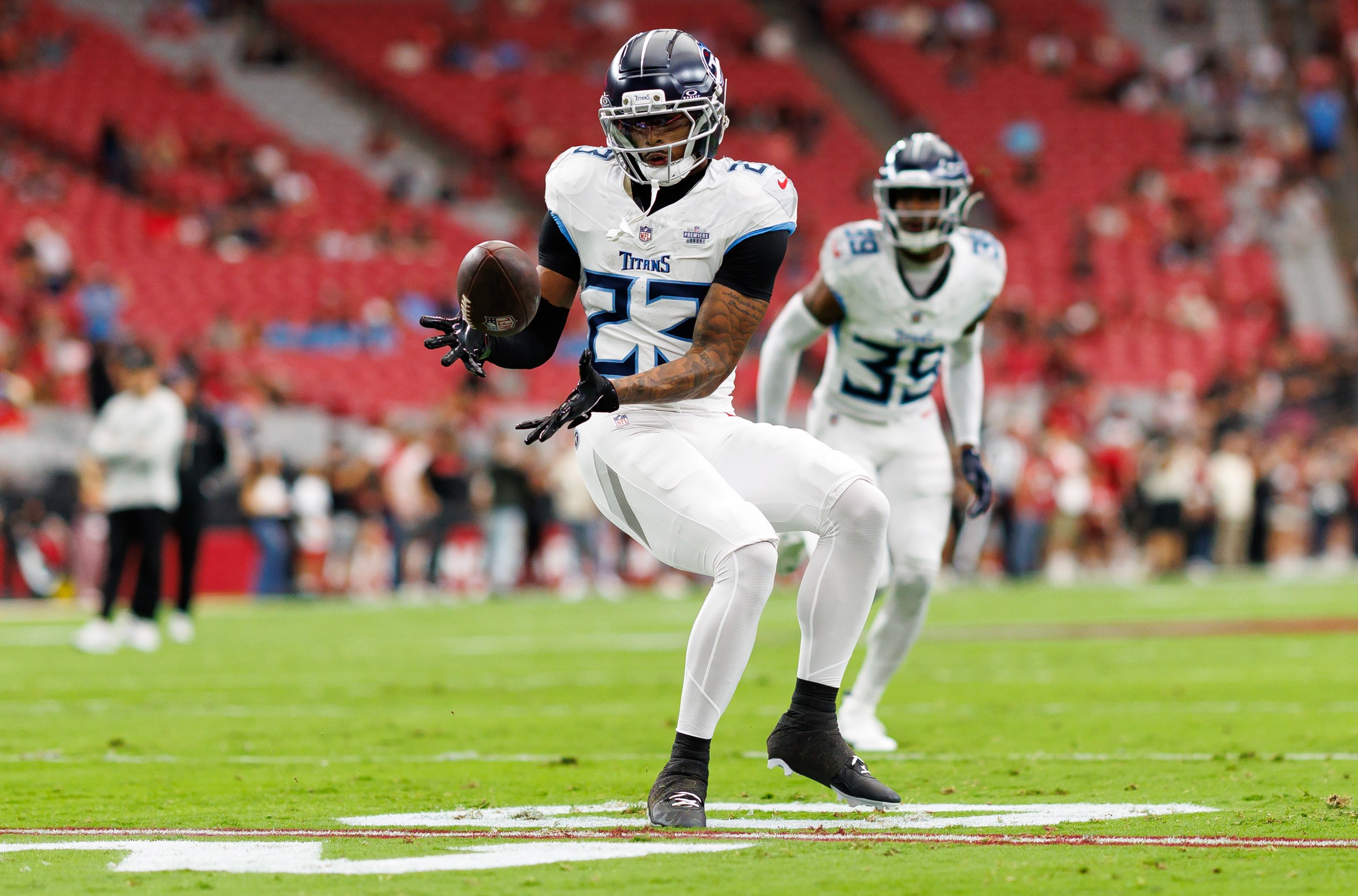 JC Latham returns to practice for the Titans